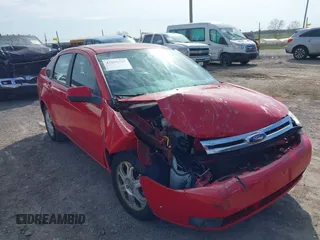 2008 Ford Focus SE with VIN 1FAHP35N58W219099, listed as a IAAI auction lot 42059347 with 209,309 mi miles. Bid and sale history available at carsss.com. Image 6.