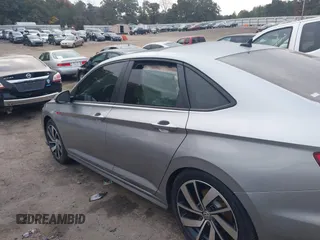 2019 Volkswagen Jetta GLI S z VIN 3VW5T7BU4KM165083, wystawiony jako IAAI lot #40729763 z przebiegiem 75 414 mil mil oraz . Historia ofert i sprzedaży dostępna na DreamBid. Obrazek 14.