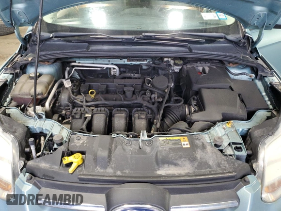 2012 Ford Focus SE with VIN 1FAHP3F27CL149328, listed as a Copart auction lot 56000325 with 147,097 mi miles and Salvage Title. Bid and sale history available at DreamBid. Image 11.