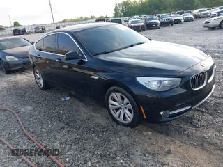 2013 BMW 5 Series GT 535i xDrive with VIN WBASP2C50DC338989, listed as a IAAI auction lot 42041585 with 121,429 mi miles. Bid and sale history available at carsss.com. Image 1.