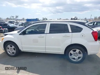 2009 Dodge Caliber SXT z VIN 1B3HB48A79D241014, wystawiony jako IAAI lot #42261703 z przebiegiem 250 197 mil mil oraz . Historia ofert i sprzedaży dostępna na DreamBid. Obrazek 14.