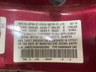 2010 Honda Insight LX z VIN JHMZE2H59AS032860, wystawiony jako Copart lot #60861945 z przebiegiem 253 444 mil mil oraz Czysty tytuł • Clean title. Historia ofert i sprzedaży dostępna na DreamBid. Obrazek 10.