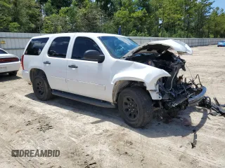 2014 Chevrolet Tahoe Commercial with VIN 1GNLC2E04ER202441, listed as a Copart auction lot 61310725 with 117,443 mi miles and Salvage title. Bid and sale history available at DreamBid. Image 4.