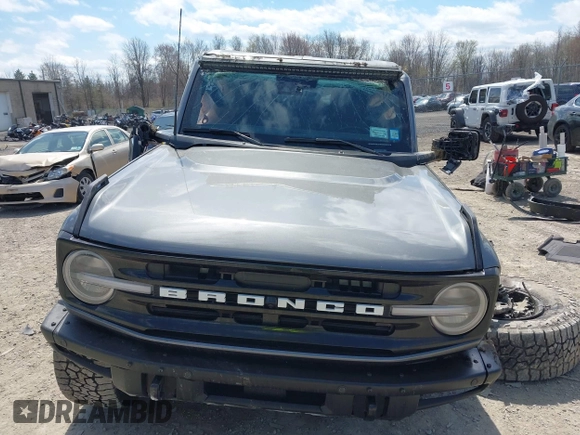 2022 Ford Bronco with VIN 1FMEE5DP3NLB03118, listed as a IAAI auction lot 42096181 with 62,685 mi miles and . Bid and sale history available at DreamBid. Image 12.