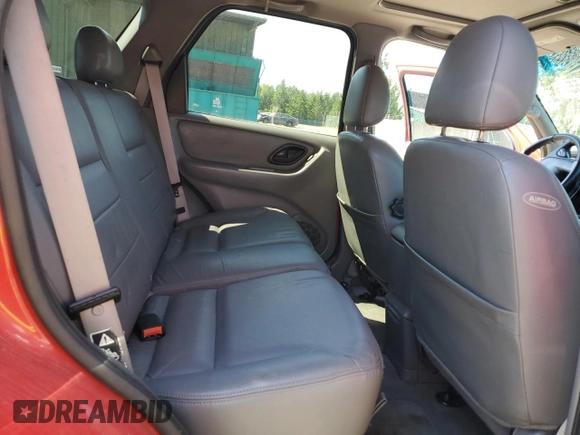 2002 Ford Escape XLT Choice with VIN 1FMCU04122KB12659, listed as a Copart auction lot 63816155 with 256,536 mi miles and Salvage title. Bid and sale history available at DreamBid. Image 11.
