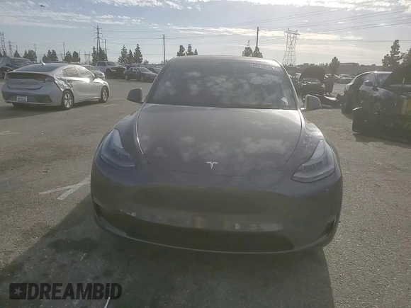 2022 Tesla Model Y Performance with VIN 7SAYGDEF3NF490643, listed as a Copart auction lot 46975825 with 50,792 mi miles and Salvage Title. Bid and sale history available at DreamBid. Image 11.