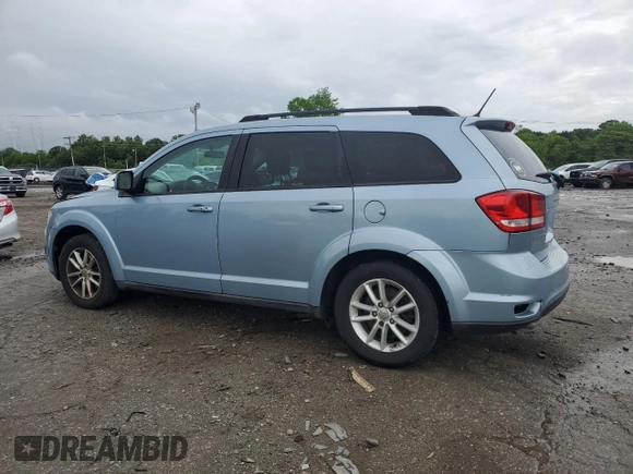 2013 Dodge Journey SXT with VIN 3C4PDCBG0DT619382, listed as a Copart auction lot 56565205 with 176,112 mi miles and Salvage title. Bid and sale history available at DreamBid. Image 2.