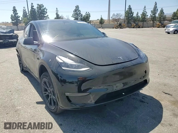 2024 Tesla Model Y Long Range with VIN 7SAYGDEE0RF123793, listed as a Copart auction lot 57177305 with 20,053 mi miles and Salvage title. Bid and sale history available at DreamBid. Image 14.