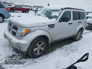 2007 Dodge Nitro SLT with VIN 1D8GU58K07W734541, listed as a IAAI auction lot 41556413 with 221,119 mi miles. Bid and sale history available at carsss.com. Image 2.