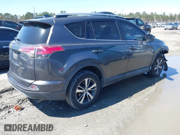 2018 Toyota RAV4 XLE with VIN 2T3WFREV9JW503136, listed as a IAAI auction lot 41815266 with 118,585 mi miles. Bid and sale history available at carsss.com. Image 4.