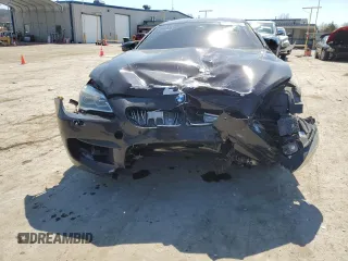 2016 BMW M6 z VIN WBS6E9C50GGF92519, wystawiony jako Copart lot #47774004 z przebiegiem 86 679 mil mil oraz Szkoda całkowita • Salvage title. Historia ofert i sprzedaży dostępna na DreamBid. Obrazek 5.