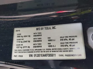2019 Tesla Model 3 Mid Range with VIN 5YJ3E1EA4KF305611, listed as a IAAI auction lot 41916738 with 59,101 mi miles and . Bid and sale history available at carsss.com. Image 9.