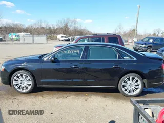 2015 Audi A8 L 4.0T with VIN WAU32AFD1FN021343, listed as a IAAI auction lot 41634469 with 88,229 mi miles. Bid and sale history available at carsss.com. Image 15.