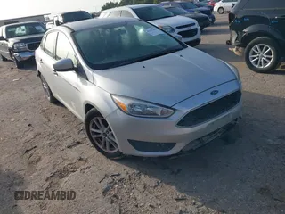 2018 Ford Focus SE z VIN 1FADP3F21JL251042, wystawiony jako IAAI lot #42597394 z przebiegiem Nie podano mil oraz . Historia ofert i sprzedaży dostępna na DreamBid. Obrazek 1.
