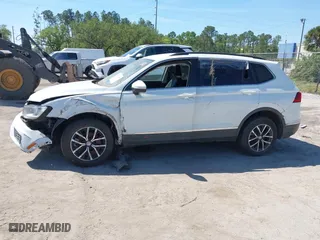 2021 Volkswagen Tiguan SE with VIN 3VV2B7AX4MM031490, listed as a IAAI auction lot 41829654 with 55,739 mi miles. Bid and sale history available at carsss.com. Image 13.