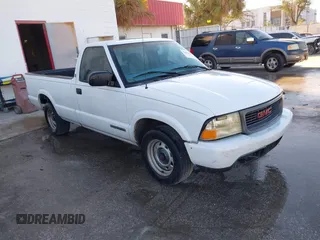 1999 GMC Sonoma with VIN 1GTCS1448XK513781, listed as a IAAI auction lot 41604322 with 216,174 mi miles. Bid and sale history available at carsss.com. Image 1.