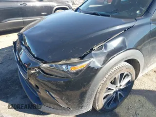2018 Mazda CX-3 Touring with VIN JM1DKDC70J0325325, listed as a IAAI auction lot 40914334 with 63,978 mi miles. Bid and sale history available at carsss.com. Image 6.