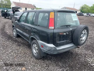 2000 Honda CR-V z VIN JHLRD1846YS009409, wystawiony jako IAAI lot #42253321 z przebiegiem 193 070 mil mil oraz . Historia ofert i sprzedaży dostępna na DreamBid. Obrazek 3.