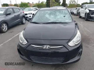 2015 Hyundai Accent GLS z VIN KMHCT4AE8FU827019, wystawiony jako IAAI lot #42179517 z przebiegiem 52 039 mil mil oraz . Historia ofert i sprzedaży dostępna na DreamBid. Obrazek 12.