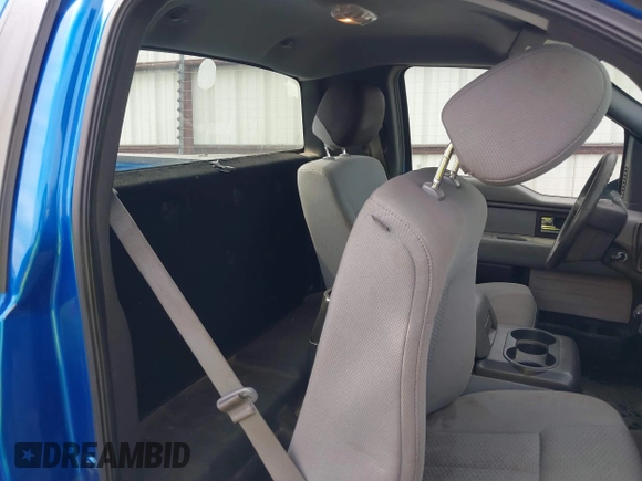 2013 Ford F-150 XL with VIN 1FTMF1CM4DKF58917, listed as a IAAI auction lot 42075200 with 133,401 mi miles and . Bid and sale history available at DreamBid. Image 8.