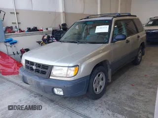 2000 Subaru Forester L with VIN JF1SF6350YH716384, listed as a IAAI auction lot 42809829 with 238,817 mi miles and . Bid and sale history available at DreamBid. Image 2.