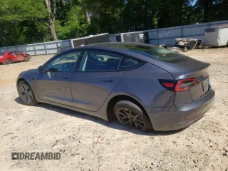 2023 Tesla Model 3 with VIN 5YJ3E1EA1PF664941, listed as a Copart auction lot 58097005 with 39,391 mi miles and Salvage title. Bid and sale history available at DreamBid. Image 2.