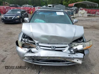 2002 Honda Accord SE z VIN 1HGCG56792A109226, wystawiony jako IAAI lot #42155995 z przebiegiem 238 789 mil mil oraz . Historia ofert i sprzedaży dostępna na DreamBid. Obrazek 12.