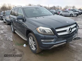 2014 Mercedes-Benz GL 450 z VIN 4JGDF7CE6EA282609, wystawiony jako IAAI lot #41665602 z przebiegiem 103 737 mil mil oraz . Historia ofert i sprzedaży dostępna na DreamBid. Obrazek 1.