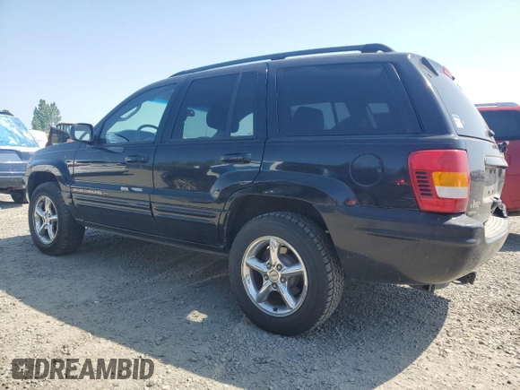 2002 Jeep Grand Cherokee Limited with VIN 1J8GW58NX2C158544, listed as a Copart auction lot 54937665 with 259,089 mi miles and Salvage title. Bid and sale history available at DreamBid. Image 2.