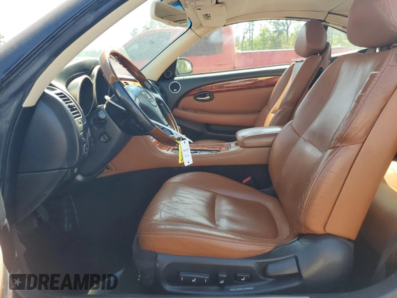 2003 Lexus SC 430 with VIN JTHFN48Y730047333, listed as a Copart auction lot 52112085 with 106,750 mi miles and Salvage title. Bid and sale history available at DreamBid. Image 7.