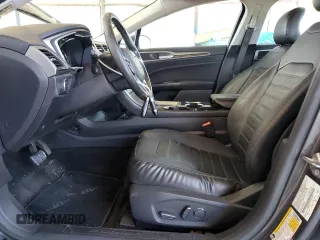 2015 Ford Fusion SE Hybrid with VIN 3FA6P0LU5FR218454, listed as a Copart auction lot 60682065 with 218,668 mi miles and Salvage title. Bid and sale history available at DreamBid. Image 7.