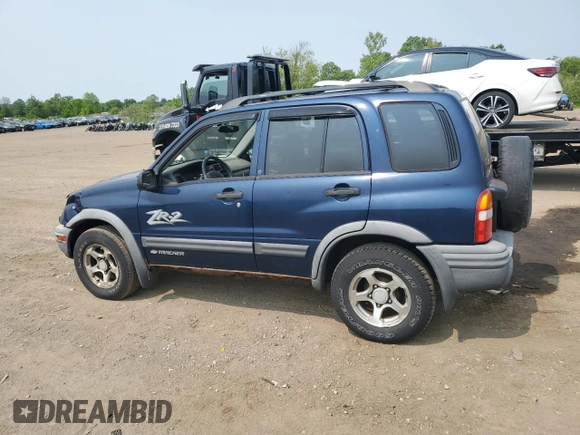 2004 Chevrolet Tracker ZR2 z VIN 2CNBJ734346903751, wystawiony jako Copart lot #59300765 z przebiegiem 126 924 mil mil oraz Szkoda całkowita • Salvage title. Historia ofert i sprzedaży dostępna na DreamBid. Obrazek 2.