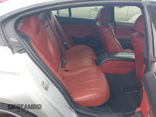 2014 BMW 6 Series 650i z VIN WBA6B2C58ED129639, wystawiony jako IAAI lot #42171786 z przebiegiem 108 677 mil mil oraz . Historia ofert i sprzedaży dostępna na DreamBid. Obrazek 8.