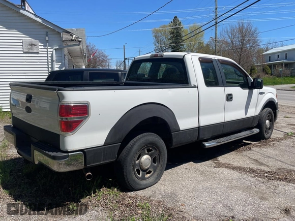 2009 Ford F-150 STX with VIN 1FTRX12879FA71573, listed as a Copart auction lot 56188705 with 228,051 mi miles and Clean Title. Bid and sale history available at DreamBid. Image 4.