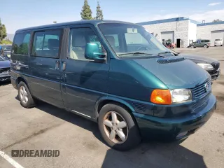 2003 Volkswagen EuroVan с VIN WV2KB47043H001319, выставлен на аукционе Copart как лот 73758024 с пробегом 88 497 миль миль и Чистый • Clean title. История ставок и продаж доступна на DreamBid. Изображение 4.