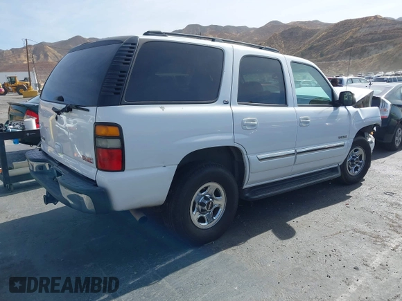 2005 GMC Yukon SLT z VIN 1GKEC13T05R273813, wystawiony jako IAAI lot #40796306 z przebiegiem 239 435 mil mil oraz . Historia ofert i sprzedaży dostępna na DreamBid. Obrazek 4.