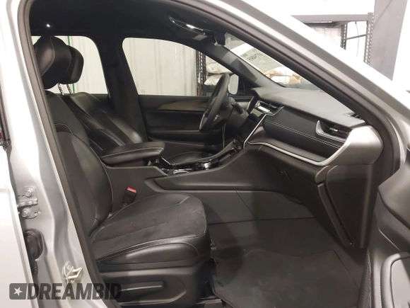 2023 Jeep Grand Cherokee Altitude with VIN 1C4RJHAGXP8882546, listed as a IAAI auction lot 41794805 with 17,071 mi miles and . Bid and sale history available at DreamBid. Image 5.