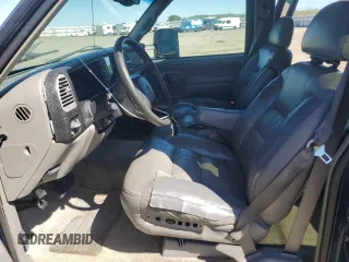 1999 Chevrolet Suburban with VIN 1GNEC16R1XJ394144, listed as a Copart auction lot 50418185 with 173,037 mi miles and Salvage title. Bid and sale history available at DreamBid. Image 7.
