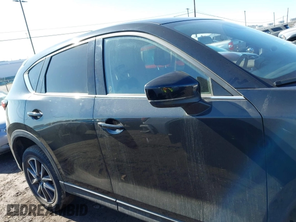 2018 Mazda CX-5 Grand Touring with VIN JM3KFBDM5J0441518, listed as a IAAI auction lot 41748941 with 64,639 mi miles. Bid and sale history available at carsss.com. Image 13.