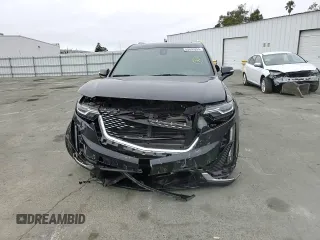 2022 Cadillac XT6 Premium Luxury with VIN 1GYKPDRS5NZ110989, listed as a Copart auction lot 69600894 with 56,148 mi miles and Salvage Title. Bid and sale history available at carsss.com. Image 11.