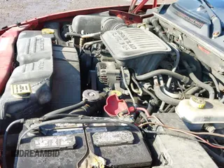 2004 Dodge Dakota Sport z VIN 1D7HG38K24S522621, wystawiony jako IAAI lot #42940104 z przebiegiem 197 418 mil mil oraz . Historia ofert i sprzedaży dostępna na DreamBid. Obrazek 12.