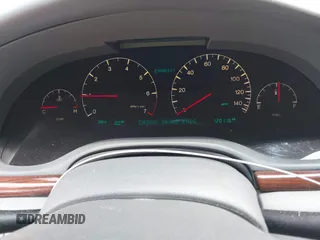 2002 Cadillac Seville Touring STS z VIN 1G6KY54902U102873, wystawiony jako IAAI lot #39710788 z przebiegiem 120 116 mil mil oraz . Historia ofert i sprzedaży dostępna na DreamBid. Obrazek 7.