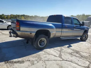 2003 GMC Sierra 3500 SLT z VIN 1GTJC33113F121042, wystawiony jako Copart lot #73668454 z przebiegiem 246 510 mil mil oraz Szkody całkowita. Historia ofert i sprzedaży dostępna na DreamBid. Obrazek 3.