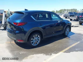 2021 Mazda CX-5 Grand Touring with VIN JM3KFBDM8M1426932, listed as a IAAI auction lot 41847448 with 17,933 mi miles. Bid and sale history available at carsss.com. Image 4.