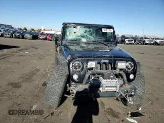 2009 Jeep Wrangler Rubicon with VIN 1J4GA64169L765933, listed as a Copart auction lot 84963104 with 107,190 mi miles and Salvage Title. Bid and sale history available at DreamBid. Image 11.