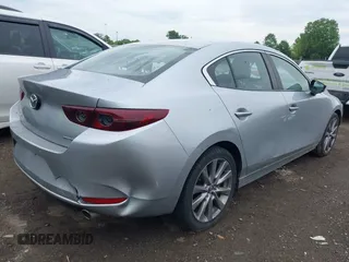 2020 Mazda 3 Select with VIN 3MZBPACL0LM131878, listed as a IAAI auction lot 42274393 with 105,656 mi miles and . Bid and sale history available at DreamBid. Image 4.