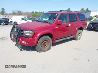 1999 Toyota 4Runner Limited z VIN JT3HN87R6X0202797, wystawiony jako IAAI lot #42153616 z przebiegiem 154 433 mil mil oraz . Historia ofert i sprzedaży dostępna na DreamBid. Obrazek 2.