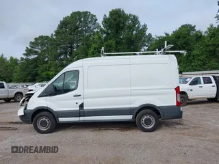 2015 Ford Transit Cargo with VIN 1FTNR1CM2FKB29029, listed as a IAAI auction lot 42286089 with 130,845 mi miles and . Bid and sale history available at DreamBid. Image 14.