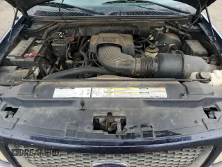 2000 Ford F-150 XL with VIN 1FTRX17L7YNC24292, listed as a Copart auction lot 58852925 with 213,318 mi miles and Salvage title. Bid and sale history available at DreamBid. Image 11.