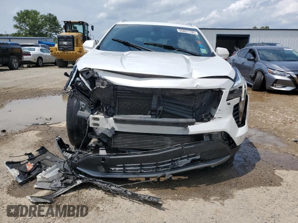 2019 Cadillac XT4 FWD Premium Luxury с VIN 1GYFZCR41KF127888, выставлен на аукционе Copart как лот 55027135 с пробегом 111 057 миль миль и Списание • Salvage title. История ставок и продаж доступна на DreamBid. Изображение 5.